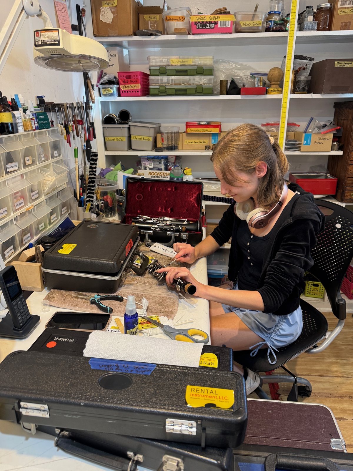 One of our band technicians servicing a clarinet at the repair bench